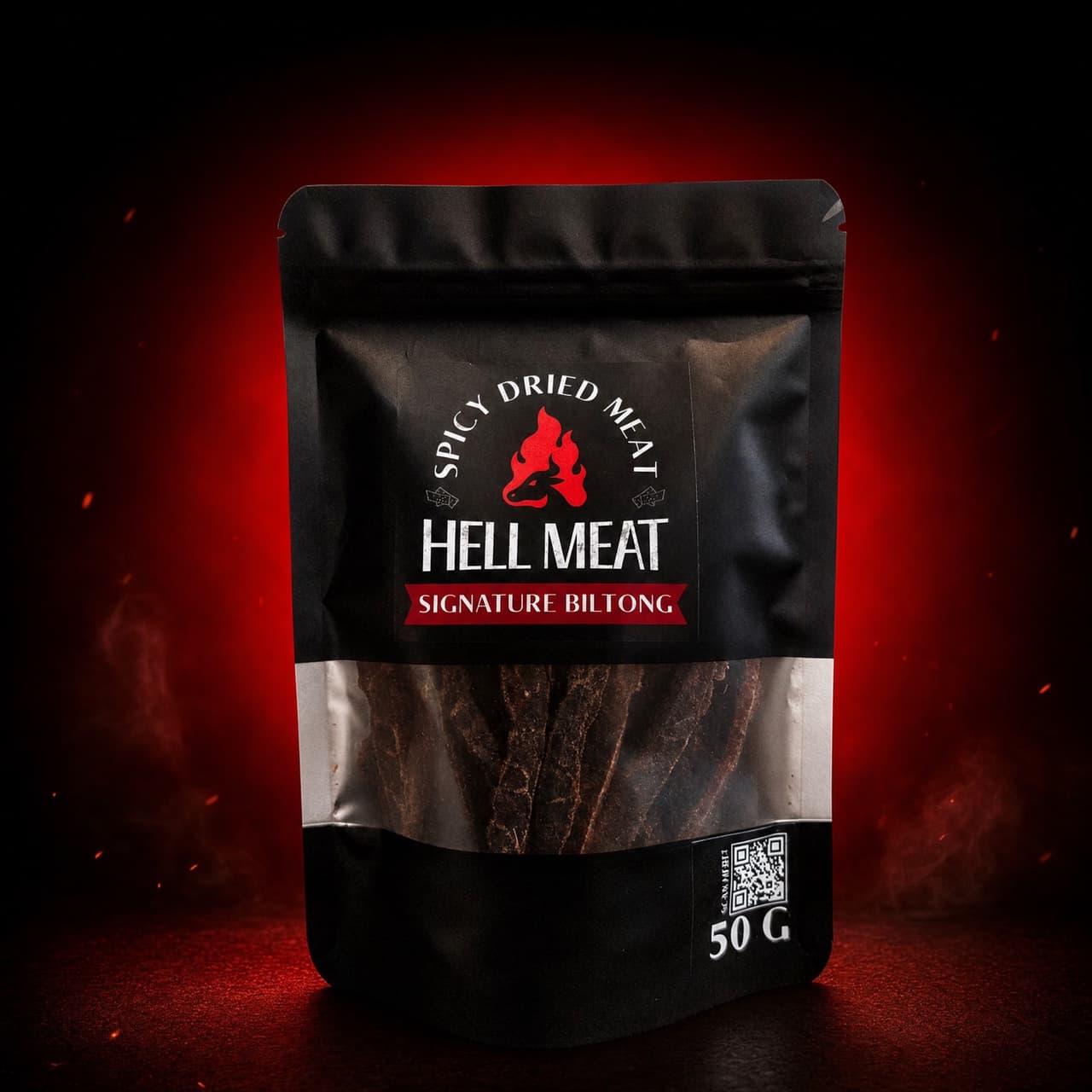 ซอง Hell Meat Signature Biltong 50 กรัม บนพื้นหลังสีแดงดำ